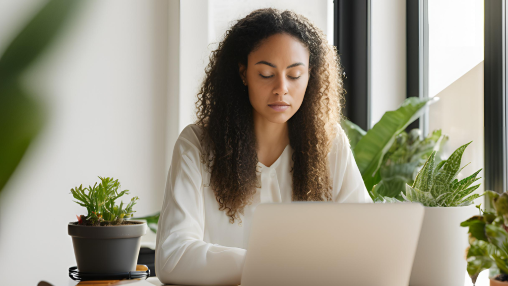 Women studying emotional intelligence using AI on her laptop.